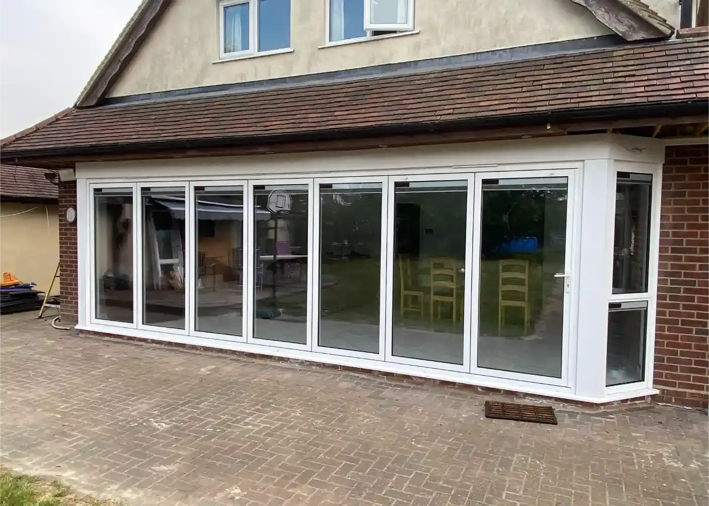 Large white bi-fold doors