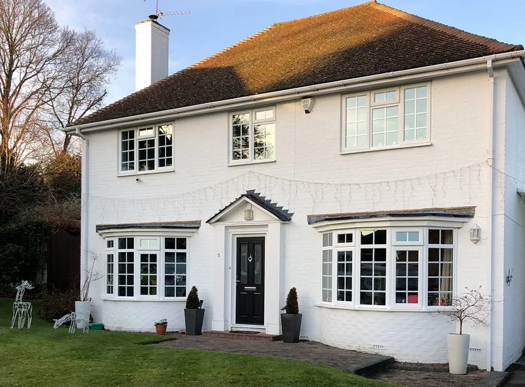 Finished property with white uPVC replacement windows