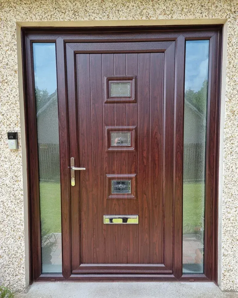 Woodgrain entrance door with glazed sidelights